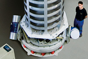 Spiral conveyor with motor vibrator unit